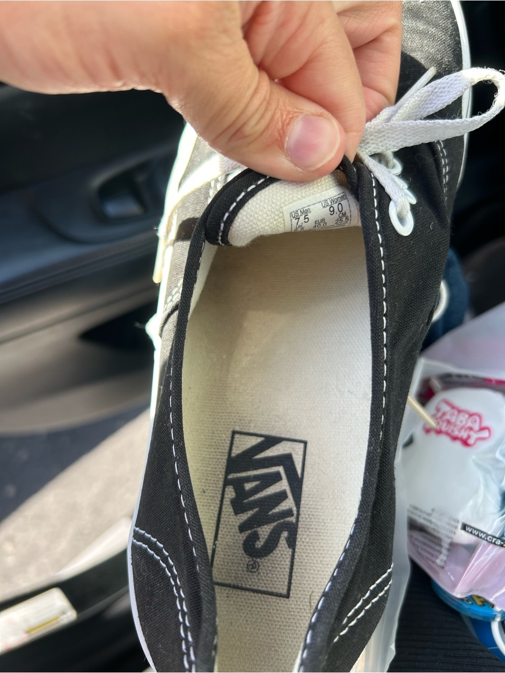 Vans Black and White Low-Top Canvas Sneakers